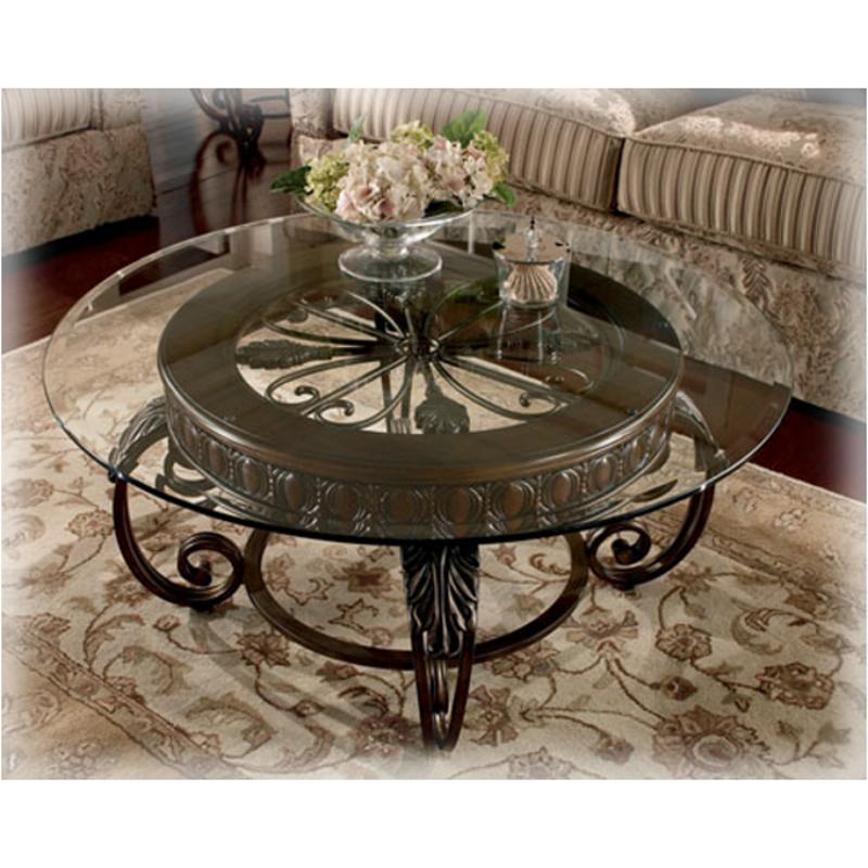 T399 8t Ashley Furniture Tullio Living Room Round Cocktail Table