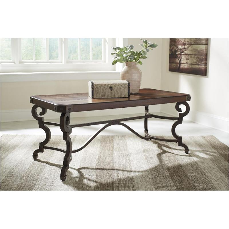 T709 1 Ashley Furniture Hadelyn Brown Rectangular Tail Table