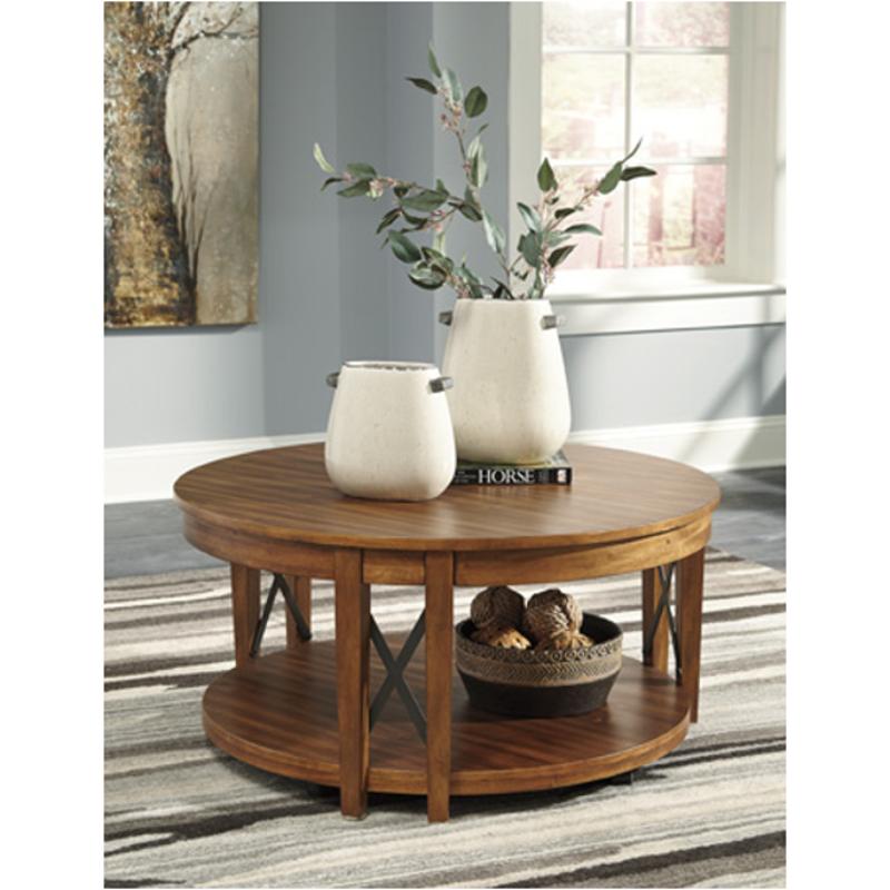 T433 8 Ashley Furniture Emilander Round Tail Table